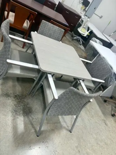 Square table with steelcase side chairs at Peach State Office Furniture, Atlanta